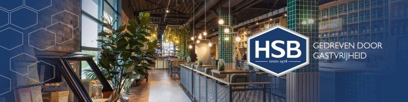 Moderne restaurantinterieur met groene accenten.